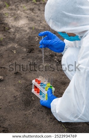 Taking soil samples from the field. Selective focus. nature.
