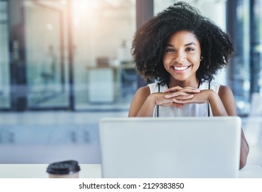 Taking the time to reflect on the business. Cropped shot of an attractive young businesswoman in her office. - Shutterstock ID 2129383850