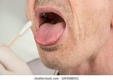 Taking a  virus test sample from a throat