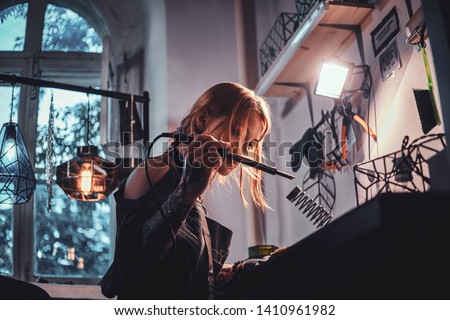 Similar – lifestyle shot of smart kid girl playing checkers at home