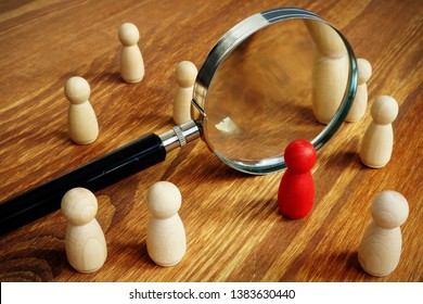 Talent acquisition and management. Magnifying glass and gavel.