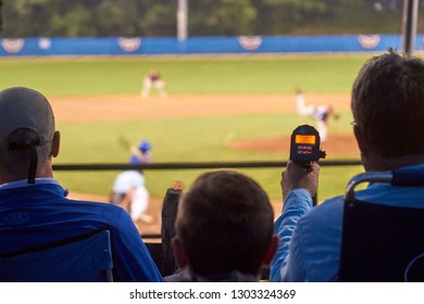 Talent Scouts With Radar Guns During A Baseball Game In Cape Cod           