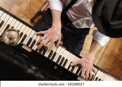 Talent and virtuosity. Top view of handsome young men playing piano - Powered by Shutterstock