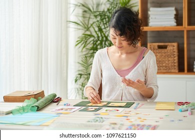 Talented Asian Woman Making Greeting Cards For Her Friends