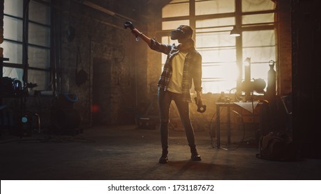 Talented Female Artist Wearing Virtual Reality Headset And Holding Digital Joysticks. She's Working On A Painting Or Sculpture, Uses Motion Controllers To Create Concept Art. Creative Modern Studio.