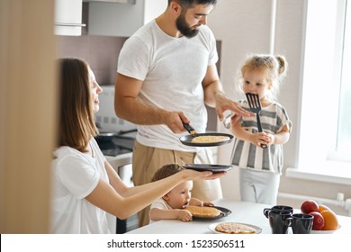 Talented Husband Treting His Family With Yummy Pancakes In The Morning, Daily Life, Free Time, Spare Time, Lifestyle