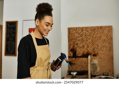 A talented woman joyfully uses a torch to create stunning jewelry in her artistic space - Powered by Shutterstock