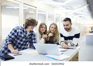 Talented Young Architects Watching Professional Master Class About Modern Innovations And Usage Of Special Software For Projecting Graphic Design Concentrating On Work Sitting In Coworking Office