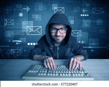 A talented young hacker hacking email address passwords concept with keyboard on desk and illustrated letters in the background