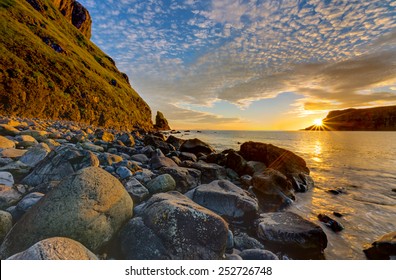 The Talisker Bay on the Isle of Skye in Scotland at sunset