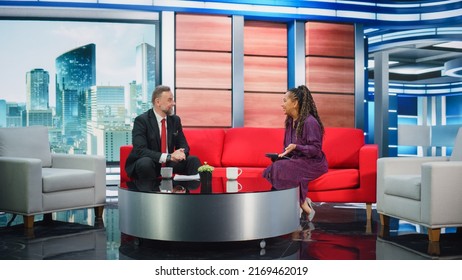 Talk Show TV Program Ending, News Interview, Discussion: Presenter and Guest Talk. Cable Channel Hosts Saying Goodbye to the Audience. Mock-up Television Studio, Newsroom Entertainment Concept - Shutterstock ID 2169462019