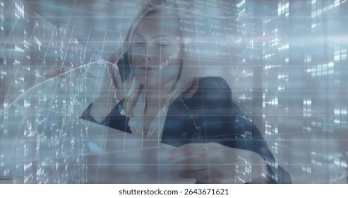 Talking businesswoman reviewing report at office desk, with smartphone and financial data overlay. Professional, analytics, modern, corporate, technology, finance, productivity