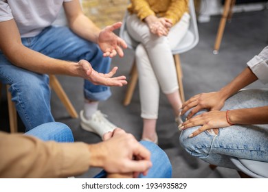 Talking Circle. Close Up Picture Of People Sitting In A Cirlce And Talking