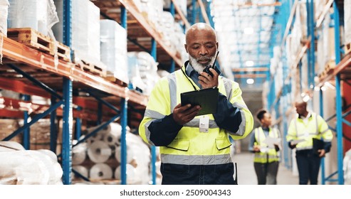 Talking, mature man and logistics with radio for communication, stock update and supply chain operation. Warehouse, supervisor and inspection with tablet for inventory check, delivery and feedback - Powered by Shutterstock - Get 15% off with code: PIKWIZARD15