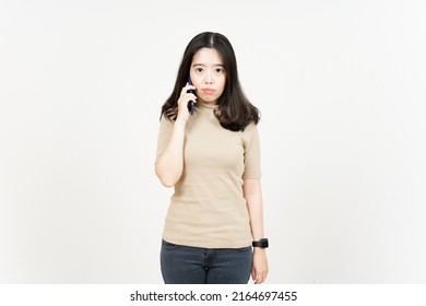 Talking on smartphone and get angry Of Beautiful Asian Woman Isolated On White Background - Shutterstock ID 2164697455