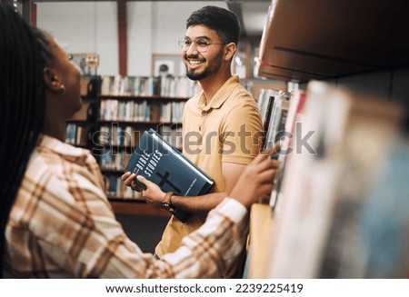Talking students, bonding and library bookshelf on school, college and university campus for education, learning and religion studying. Smile, happy man and black woman friends with textbook research