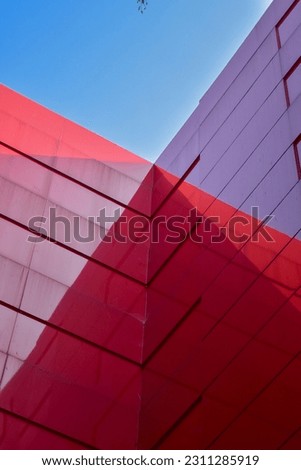 tall building with aesthetic red color