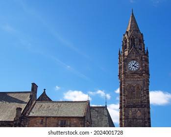 The Tall Clock Tower Of Historic 19th Century Rochdale Town Hall In Lancashire With Blue Summer Sky And White Clouds