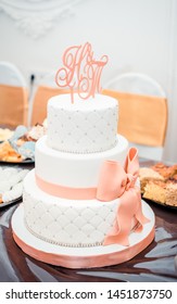 Tall Delicate Wedding Cake With Bow