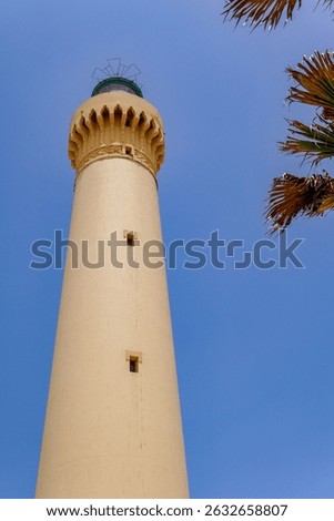 Tall and elegant lighthouse standing under a clear sky at El Hank at Casablanca, Morocco, A perfect blend of architecture and coastal serenity captured on a bright day