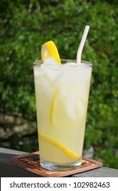 A Tall Glass Of Lemonade On The Patio