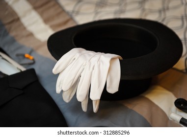 Tall hat and gloves