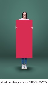 Tall High Woman And Long Banner Isolated On Green Studio Background. Unusual Delighted And Long. Copyspace For Offer, Advertising, Artwork, Inspiration And Hobby, Mood Concept. Humor, Weird Collage.