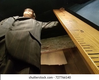 Tall Man With Ruler