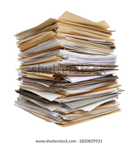 Tall messy stack of paper folders and documents isolated on white background