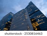 Tall modern office buildings in the center of Warsaw at night