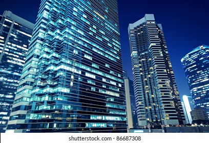 Tall office buildings by night