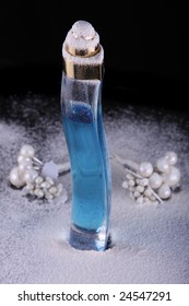 perfume in tall blue bottle