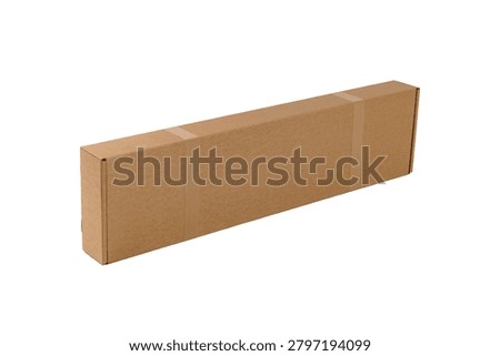 Tall rectangular cardboard shipping box sealed with packing tape, viewed from an angled perspective and isolated on a white background with abundant copy space