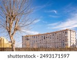 Tall residential buildings in La Linea de la Concepcion, province of Cadiz, Andalusia, Spain, under a clear blue sky.