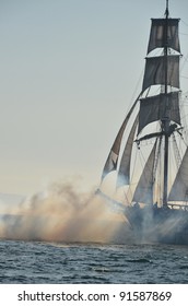 Tall Ship And Gun Fire/Tall Ship Battle/Smoke From Cannon Fire And Tall Ships