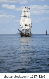 Tall Ship Sailing On Blue Waters