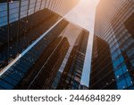 tall skyscrapers buildings looking up perspective, modern architecture of steel and glass, skyline of big city