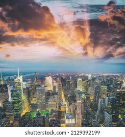 Tall Skyscrapers Of Midtown Manhattan, Night Aerial View.