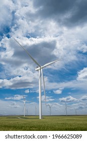 A Tall Wind Turbine Generating Electricity Near Pincher Creek Alberta Canada As Part Of The Sustainable Energy Sector.