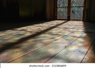 A Tall Window In The Church And A Shadow From It On The Floor