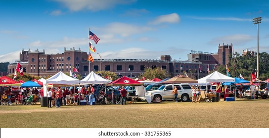 TALLAHASSEE, FL - NOV. 16, 2013:  FSU fans tailgating outside Doak Campbell Stadium before a home game against Syracuse University.  Tailgating in the open parking lots owned by the Booster Club.