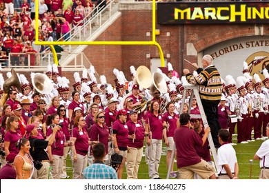 TALLAHASSEE, FL - OCT. 27:  Dr. Clifford Madsen, Distinguished Professor Of Music At FSU, Leads The Marching Chiefs Alumni To Sing The Hymn During Homecoming At Doak Campbell Stadium On Oct. 27, 2012.