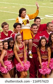 TALLAHASSEE, FL - OCT.  27:  The Florida State Cheerleading Squad Welcomes A Past Alumni Member During Homecoming At Doak Campbell Stadium In Tallahassee On Oct. 27, 2012.