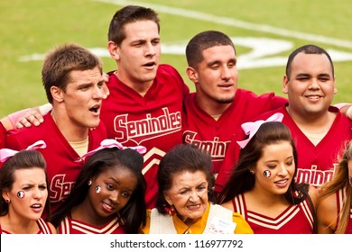 TALLAHASSEE, FL - OCT. 27:  The Florida State Cheerleading Squad Welcomes A Past Alumni Member During Homecoming At Doak Campbell Stadium  On October 27, 2012.