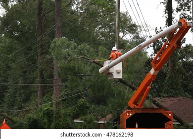 Tallahassee, FL - September 2016 - In the aftermath of hurricane Hermine, 80,000 residents and businesses left without power in Tallahassee. Cleaning and recovery started by the daylight. 