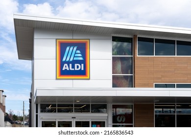 Tallahassee, FL, USA - February 11, 2022: Close up of Aldi store sign on the building. Aldi is the common brand of two German family-owned discount supermarket chains.