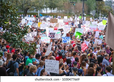 Tallahassee, Florida / United States - February 21, 2018. Large crowd gathered outside the old capitol building to protest current gun laws. Students from Douglas High School in Parkland participated.