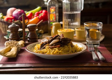 Tallarines Con Lomo Saltado Plate Of Noodles Spaghetti Pasta Comfort Food Wooden Dining Table With Sauted Meat