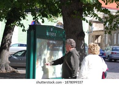 Tallinn, Estonia - 09 07 2007: Elderly Couple Looking At A Street Map