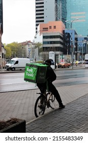 Tallinn, Estonia - 12 May 2022.
Bolt Food Delivery Company Corier On Bike In The City Center